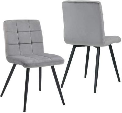 China Affordable Velvet Upholstered Kitchen Dining Chair With Strong Black Metal Legs for sale