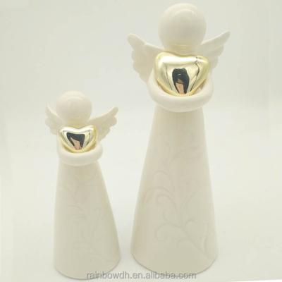 China Christmas Decoration/White Ceramic Decor Angel Figurines Decor/Room Decoration/Home Gift Christmas Holding Heart Shape for sale