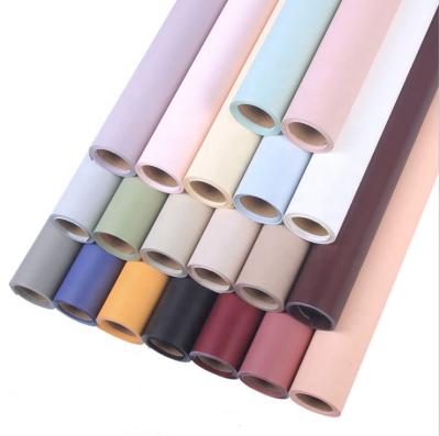 China Recycled Materials Hot Sale Matte Flower Kraft Paper Roll Waterproof Packaging for sale