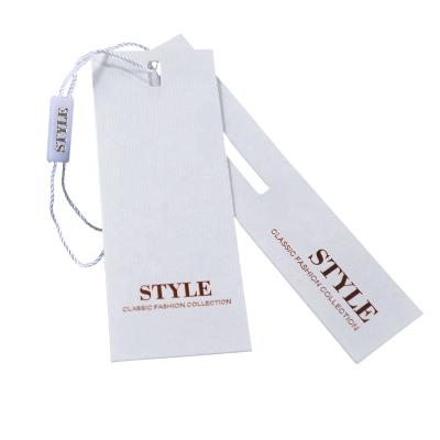 China Custom Paper Gold Foil Logo Clothing Hang Tags String Viable Direct Selling New Design for sale