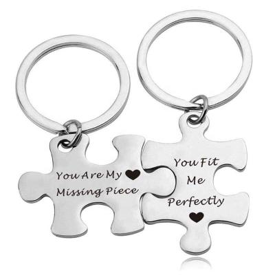 China Fashion White Durable Personalized Custom Engraving Silver Stainless Steel Puzzle Key Chain For Couples Mirror Polished for sale