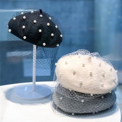 China Hot French Gauze Berets Luxury Women Character Pearl Vogue Beret Women Rivet Cashmere Beret for sale