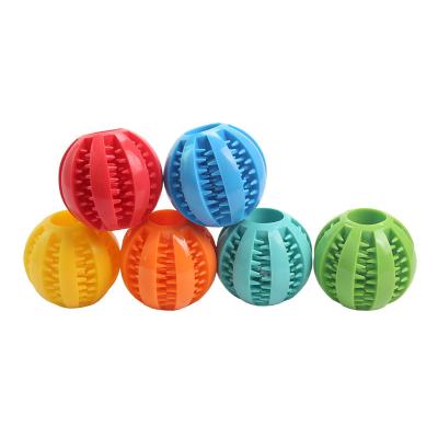 China Factory Sale Durable Durable TPR Ball Dog Chew Toys Tooth Leak Food Cleaning Dog Chewing Toys for sale