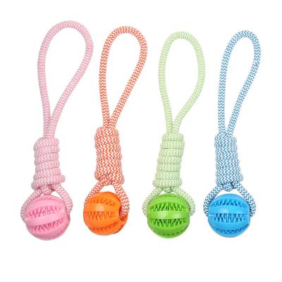 China Viable Dog Leakage Feeding Ball Rubber Teeth Chew Dog Cotton Rope Ball Throwing Toy Pet Rope Chew Ball for sale