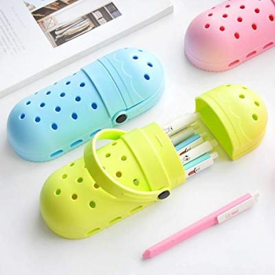 China Cute Shoe Shaped Pencil Holder Eco-friendly Silicone Pencil Case Hole Pencil Bag Large Capacity for sale