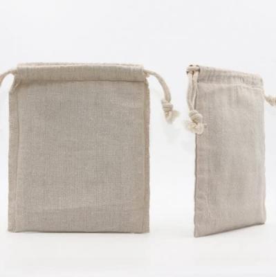 China Viable Wholesale Handmade Cotton Travel Drawstring Cotton Bag Natural Pouch Packing Gift Bag for sale