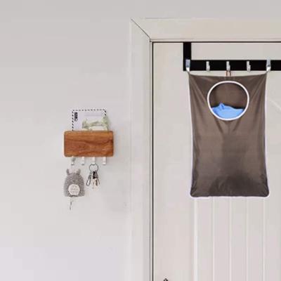 China 2020 Sustainable Hanging Laundry Hamper Bag Storage Waterproof Hanging Laundries Bag Large Dirty Clothes Pocket Behind Door Suction Cup Hooks for sale