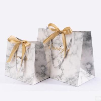 China Recyclable Custom Luxury Paper Fancy Handbags For Packaging for sale