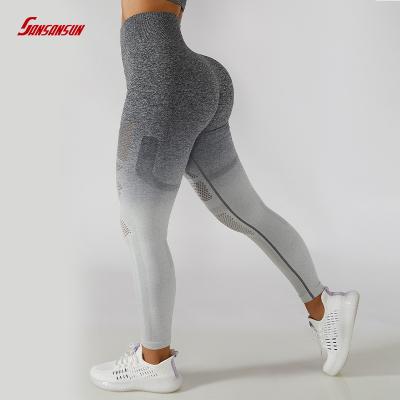 China Hip Lift Breathable Gradient Seamless Yoga Pants Hollow Out High Waist Stretch Fitness Pants Breathable Tights for sale