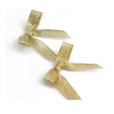 China Metallic gold ribbon bow with elastic for sale