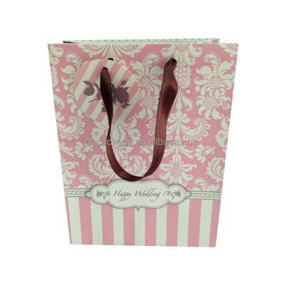 China Recycled Materials Factory Supply High Quality Pink Wedding Paper Gift Bags for sale