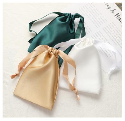 China Portable Cosmetic Dust Proof Pouch Storage Gift Christmas Satin Fabric Silk Drawstring Bag With Custom Logo for sale