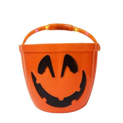 China Hotel And Resort Halloween Bucket With Flashlight Gift Candy Pumpkin Bucket for sale