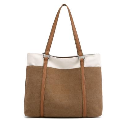 China 2022 Spring New Fashion Portable Casual Canvas Pure Color All-match Handbag For Women for sale