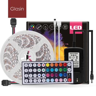 China LANDSCAPE Flash 5M 3528 DC12V 60LEDS/M Waterproof Flexible RGB Led Strip Light Kit With 44 Key IR Remote Controller 2A Adapter for sale