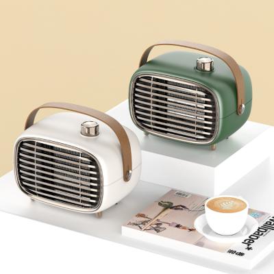 China Best Home and Office Mini PTC Portable Electric Cold-Warm Air Heater 450w 700w Wind Cool Cool Wind Heater for sale