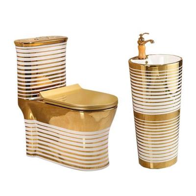 China Hot Selling Double-flow Gold Color Sanitary Ware Luxury Gold Color Ceramic WC One Piece Toilet Set With Pedestal Sink for sale