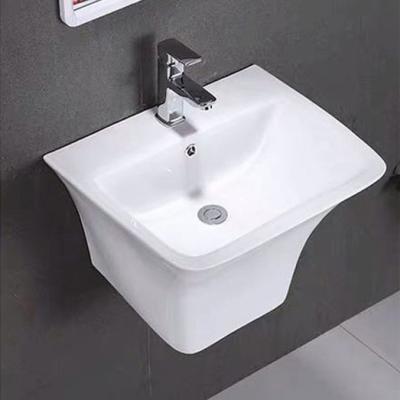 China Modern Modern style white ceramic one piece wall mounted bathroom sink small washing basin price wall hung basin for sale