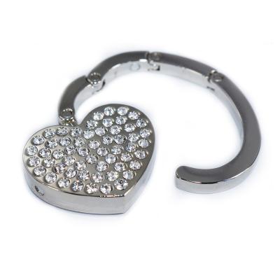 China Promotion Fashion Heart Shape Bag Hanger Purse Hook With Diamond For Women Gift for sale