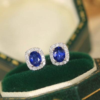 China TRENDY Xinfly 18k Gold Certificate Elegant Luxury 0.1ct Diamond Four Claw Oval Natural Stone Real Blue 0.1ct Sapphire Stud Earring for sale