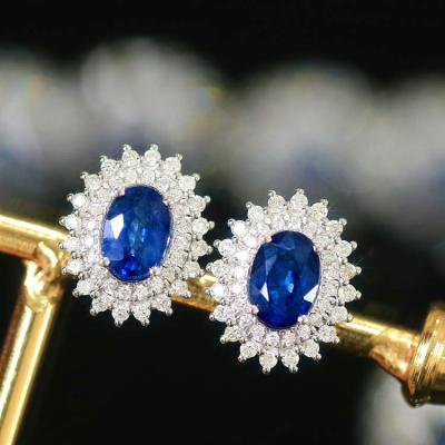 China TRENDY Xinfly 2023 Fashion 18k Solid Gold Flower Shape 0.6ct Diamond GRC 2.3ct Sri Lanka Natural Oval Royal Blue Sapphire Stud Earrings for sale