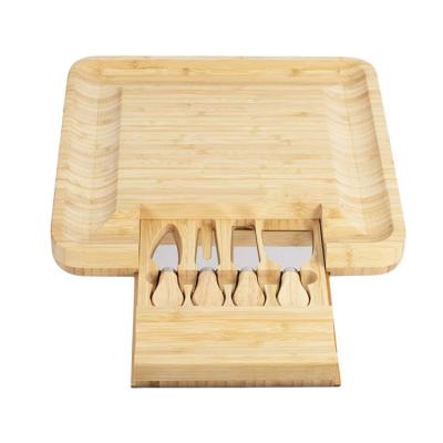 China Sustainable Wholesale Square Cheese Premium Bamboo Board Set With Slide-Out Drawer Knife Razor Fork And Spreader for sale