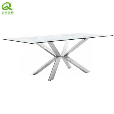 China Chrome and Rush Gold Finish Metal Base Glass Top Dining Table for sale