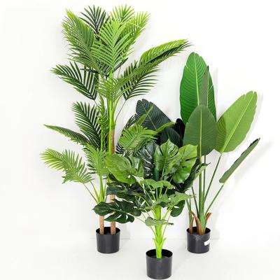 China 2022 Transient New Artificial Monstera Plants Plastic Tropical Tree Leaves Garden Decoration for sale