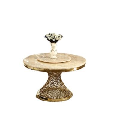 China Modern Luxury Stainless Steel Frame Round Table With Center Stone Revolving White Marble Top Dining Table for sale