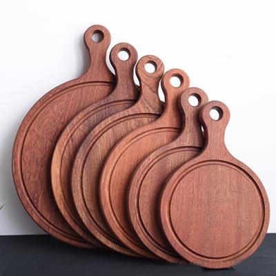 China Ebony Pizza Chopping Boards Eco Friendly Round Bamboo Pizza Skin Cutting Board for sale