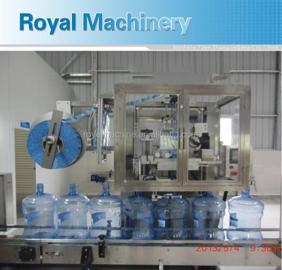 China Semi-automatic 5 Gallon Beverage Barrel Cap Sleeve Machine for sale