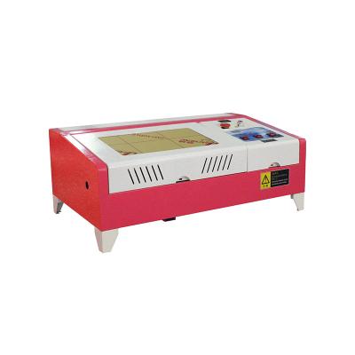 China Water-cooled CNC desktop laser engraver laser cutter Co2 portable wood engraving machine for sale