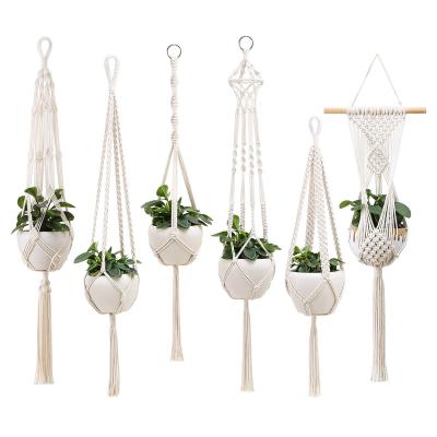 China 100% Cotton Bilink Rope 4 Legs Flowerpot Holder Eco-Friendly Handmade Macrame Planter Hanging Planter For Wall Decoration for sale