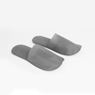 China Nonwoven Degradable Ultrasonic Primary Molding Integral-Shaped Airline and Hotel Disposable Nonwoven Slippers for sale