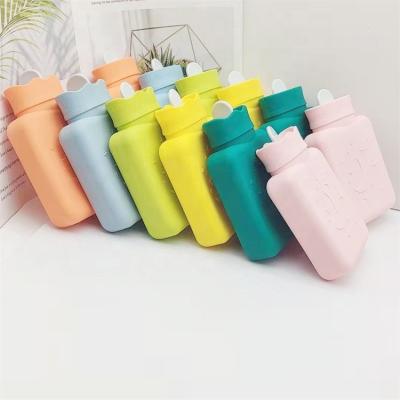 China Student Winter Silica Gel Water Bottle Warmer Hand Warmer, Water Bottle Explosion-proof Warm Bag Can Be Heated By Microwave for sale