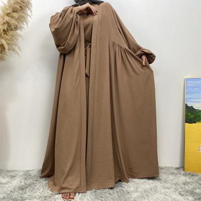 China Breathable Fashion Dubai Muslim Islamic Clothes Dubai Abaya Robe Women Elastic Cuff Middle Ruffle Pocket Casual Cardigan Islamic Long Dress for sale