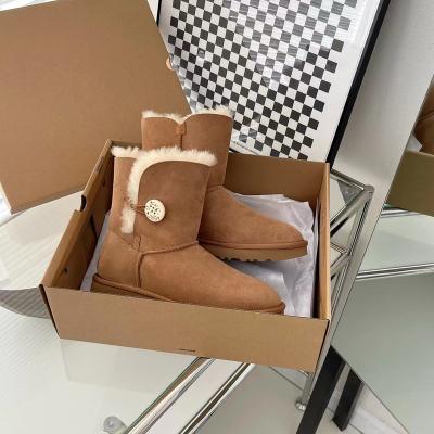 China Fashion trend winter 2023 new classic snow boots button warm and cold 5803 sheepskin wool boots for sale