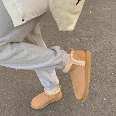 China 2023 fashion new fashion trend new V-mouth sheepskin wool snow boots wool cotton shoes women's clothing woven flat bottom to keep warm 1016221 for sale