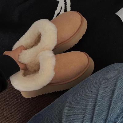 China 2023 fashion trend new thick-soled sheepskin wool overturned snow boots increase casual winter ladies warm shoes. for sale