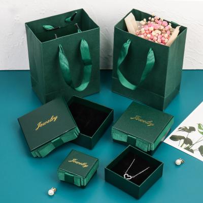 China Recycled Materials Leather Led Black Portable Slide Ring Jewelry Gift Boxes With Logo for sale