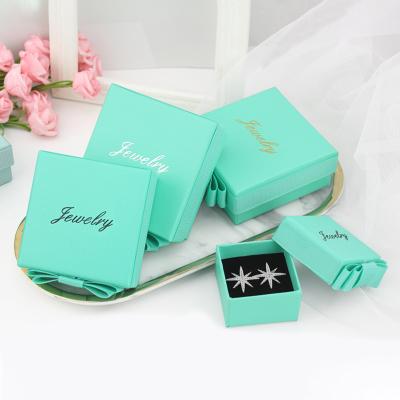 China Recycled Materials Wholesale Customized Gift Jewelry Box Package Paper Square Ring Box With Ribbon Logo for sale