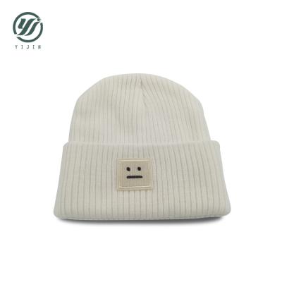 China COMMON White Custom Label Your Own Logo Knitted Beanies Winter Hat for sale