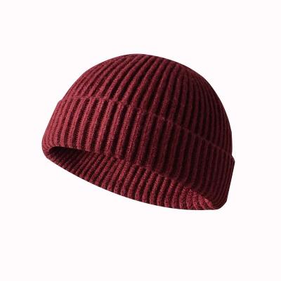 China Retro JOINT Cuff Wool Empty Skull Knit Beanie Hat For Man Mini Fisherman Beanie Hat for sale