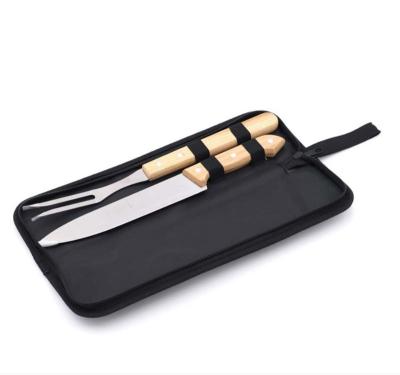 China Hot Sustainable Sales Stainless Steel BBQ Tool Kit With Wooden Handle BBQ Fork Knife Set With Nylon Carry Case for sale