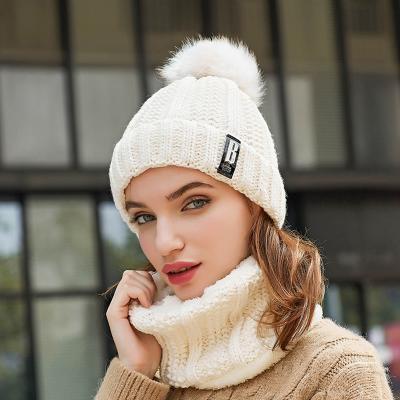 China Wholesale COMMON Winter Beanie Fur Ball Cap Pom Women Knitted Girls Warm Hats for sale