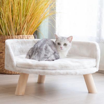 China Sustainable Wood Bottom Raised Soft Pet Bed Velvet Pet Sofa Cat Bed for sale