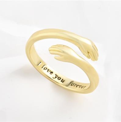 China Amazon FASHIONABLE Hot Sale I Love You Forever Hugging Hands Rings Adjustable Gold Plated Hug Ring Jewelry for sale