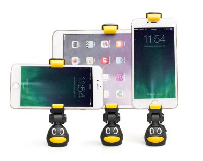 China Creative Flexible Penguin Capsule Sports Selfie Camera Stand Cartoon Mobile Phone Holder for sale