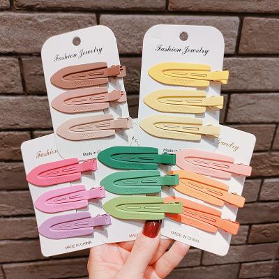 China Hairpin Colorful seamless banger face wash and makeup metal duckbill clip headwear for sale