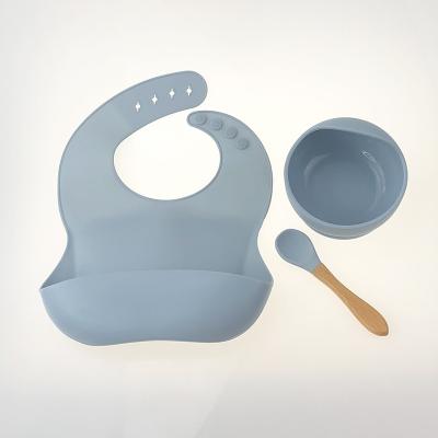 China Viable Silicone Baby Bibs Roll Baby Feeding Spoon Waterproof Silicone Toddler Tableware Set for sale